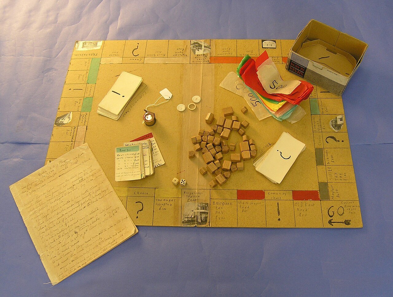 Historical board game with handwritten rules.