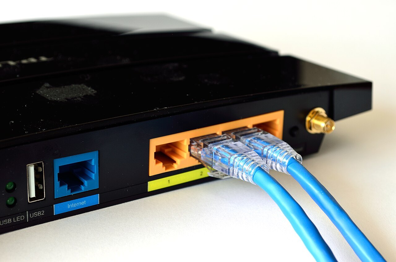 Router with Ethernet cables connected.