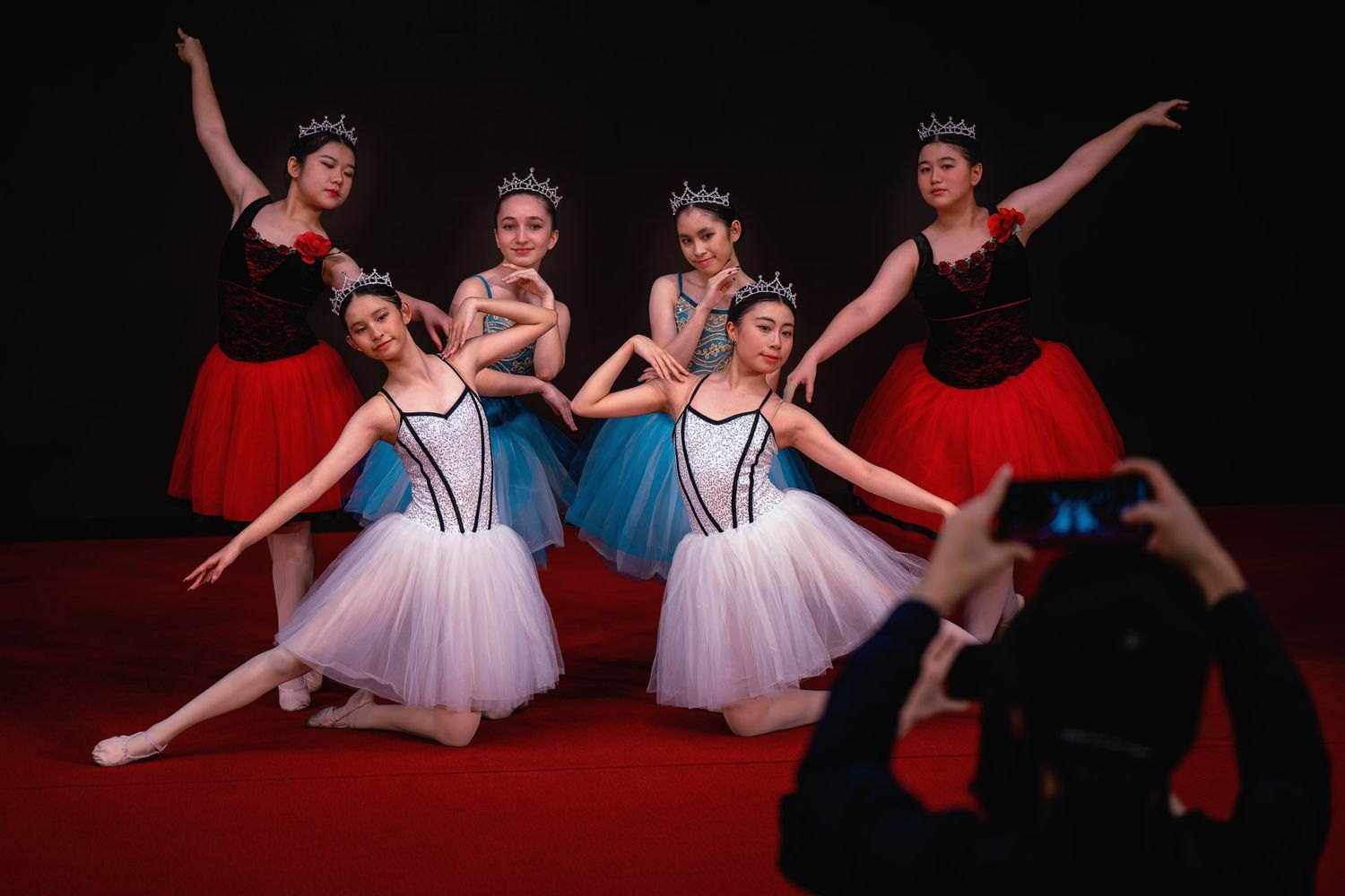Ballet ensemble on stage.