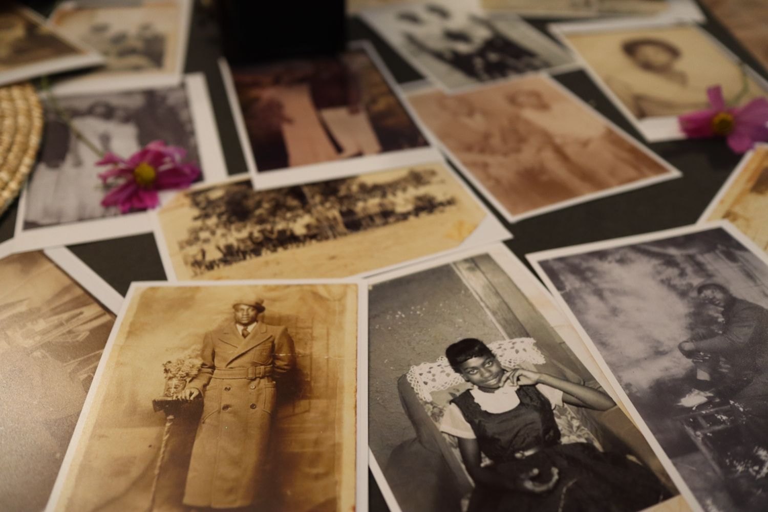 Old photographs laid out as an example of selecting pictures for questions.